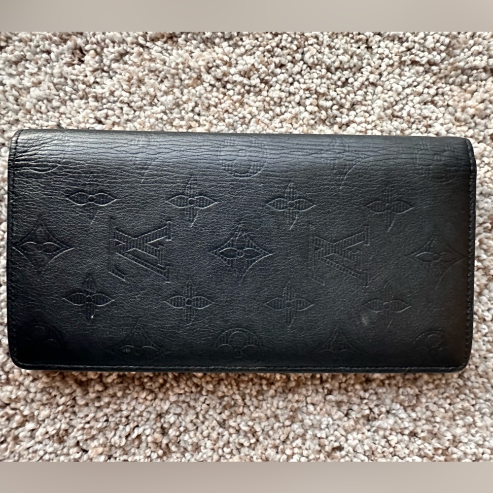 Louis Vuitton Brazza Wallet Monogram Taurillon Leather - Black. Authentic